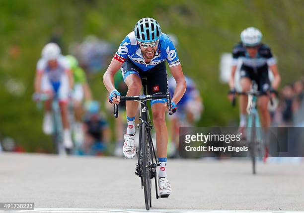 Ryder Hesjedal of Canada and team Garmin-Sharp crosses the finish line during the eighth stage of the 2014 Giro d'Italia, a 179km medium mountain...