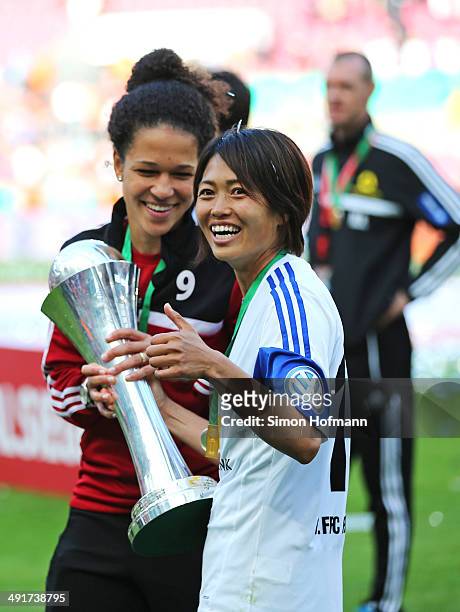 Kozue Ando and Celia Sasic celebrate winning after the Women's DFB Cup Final between SGS Essen and 1. FFC Frankfurt at RheinEnergieStadion on May 17,...