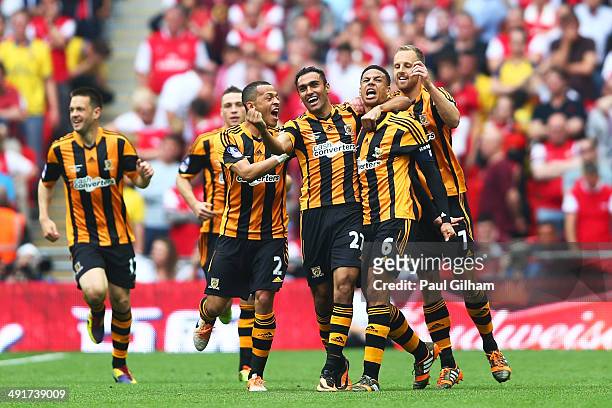 Curtis Davies of Hull City celebrates with team mates as he scores their second goal during the FA Cup with Budweiser Final match between Arsenal and...