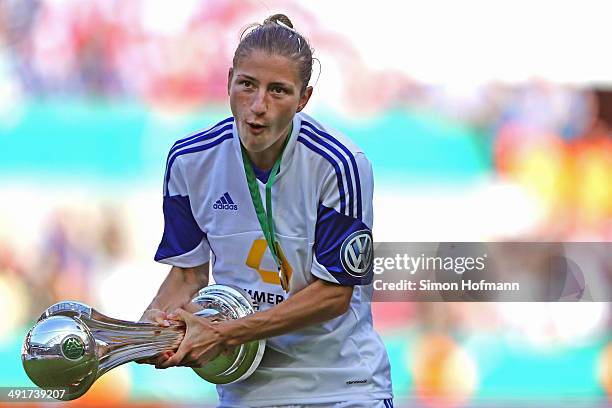 Bianca Schmidt of Frankfurt celebrates winning with the trophy after the Women's DFB Cup Final between SGS Essen and 1. FFC Frankfurt at...