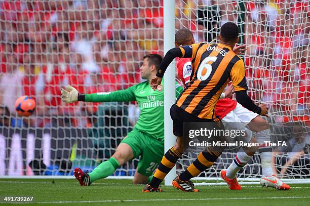 Curtis Davies of Hull City scores his team's second goal during the FA Cup with Budweiser Final match between Arsenal and Hull City at Wembley...