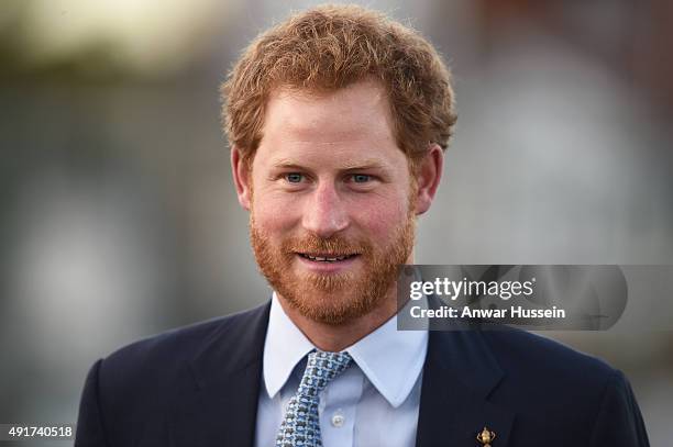 Prince Harry visits Paignton Rugby Club on October 7, 2015 in Paignton, England. Prince Harry is visiting the club in support of the RFU's World Cup...