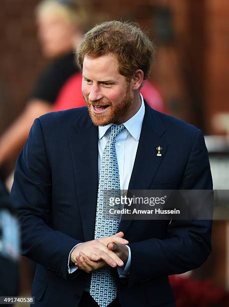 Prince Harry visits Paignton Rugby Club on October 7, 2015 in Paignton, England. Prince Harry is visiting the club in support of the RFU's World Cup...