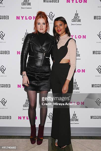 Band member from Icono Pop, Caroline Hjelt and Aino Jawo attend NYLON It Girl Prom at Gilded Lily on October 7, 2015 in New York City.