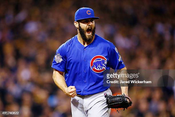 Jake Arrieta of the Chicago Cubs reacts after a double play to end the sixth inning with the bases loaded during the National League Wild Card game...