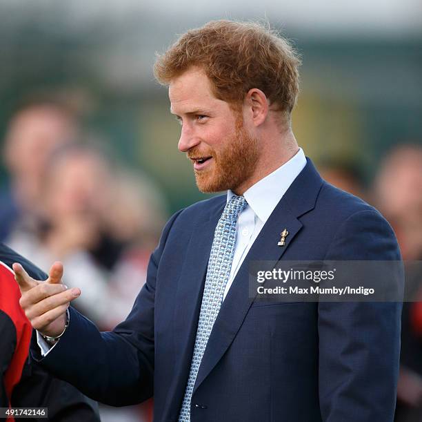 Prince Harry visits Paignton Rugby Club to present them with an RFU, Gold Standard Facilities Award on October 7, 2015 in Paignton, England.