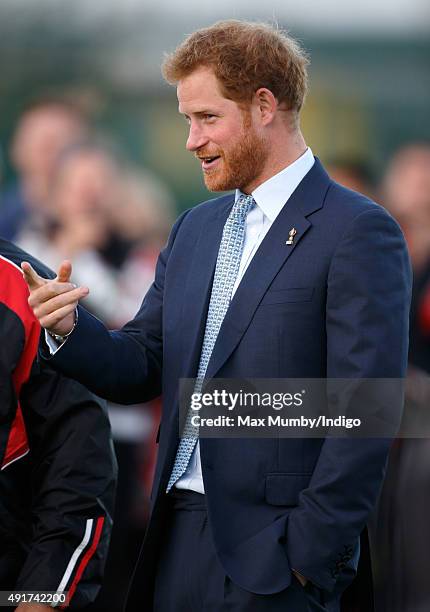 Prince Harry visits Paignton Rugby Club to present them with an RFU, Gold Standard Facilities Award on October 7, 2015 in Paignton, England.