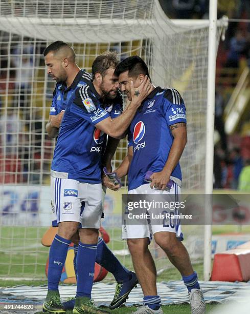 Harrison Otalvaro of Millonarios celebrates with Federico Insua after scoring the winning goal during a match between Millonarios and Deportes Tolima...