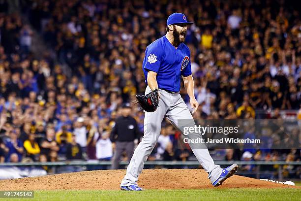 Jake Arrieta of the Chicago Cubs reacts after defeating the Pittsburgh Pirates to win the National League Wild Card game at PNC Park on October 7,...