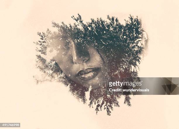 double exposure of a woman's mouth within foliage - digital composite woman stock pictures, royalty-free photos & images