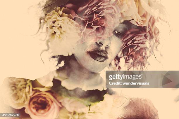 feminine double exposure image of a woman and soft flowers - goddess stock pictures, royalty-free photos & images