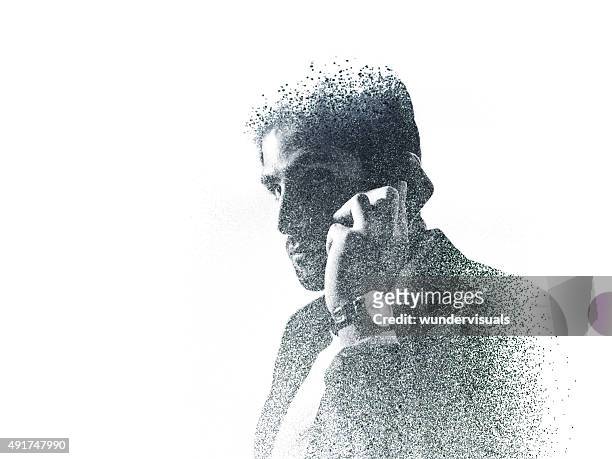 graphic image of businessman on the phone created with dots - abstract digital human face stock pictures, royalty-free photos & images