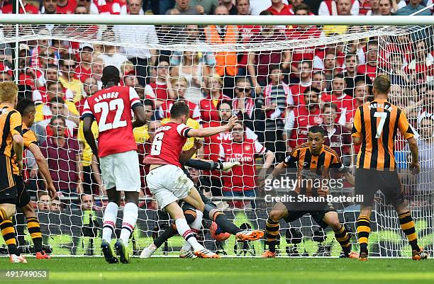 Laurent Koscielny of Arsenal scores their second goal during the FA Cup with Budweiser Final match between Arsenal and Hull City at Wembley Stadium...