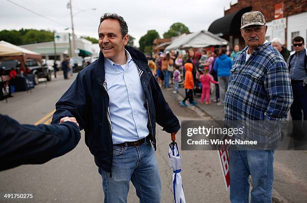 Kentucky Republican senatorial candidate Matt Bevin greets voters at the Fountain Run BBQ Festival while campaigning for the Republican primary May...