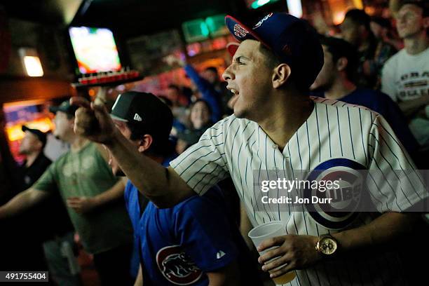 Brandon Oliceron of Chicago react after Jake Arrieta of the Chicago Cubs was hit by a pitch and the benches cleared during the seventh inning of the...