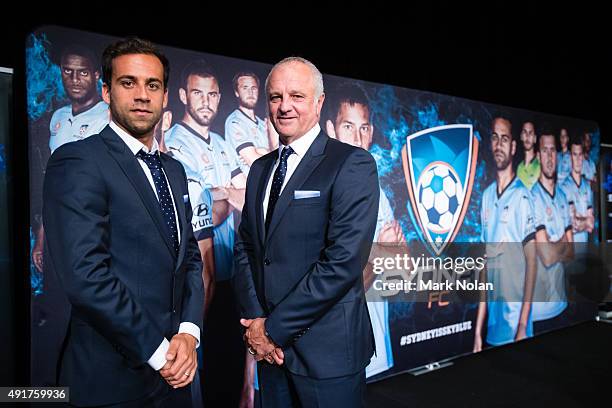 Sydney FC captain Alex Brosque and coach Graham Arnold pose during the Sydney FC A-League season launch at The Westin hotel on October 8, 2015 in...