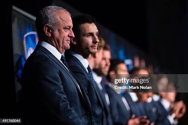 Sydney FC coach Graham Arnold lines up with his team during the Sydney FC A-League season launch at The Westin hotel on October 8, 2015 in Sydney,...