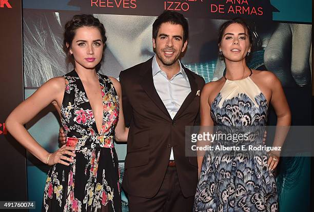 Actress Ana de Armas, director Eli Roth and actress Lorenza Izzo attend the premiere of Lionsgate's "Knock Knock" at TCL Chinese 6 Theatres on...