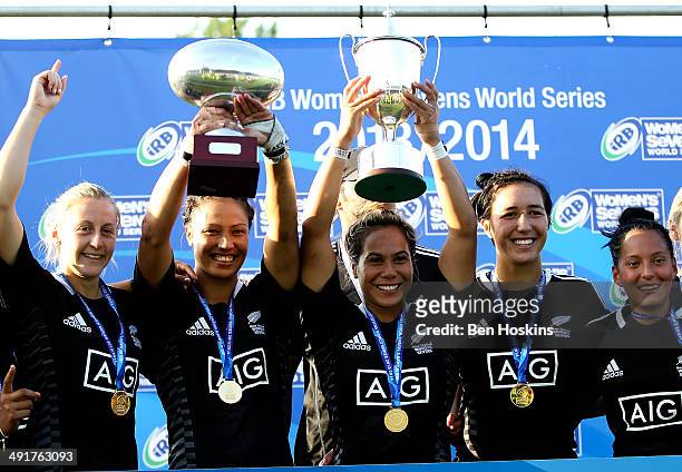 Huriana Manuel of New Zealand lifts the series trophy during the IRB Women's Sevens World Series on May 17, 2014 in Amsterdam, Netherlands.