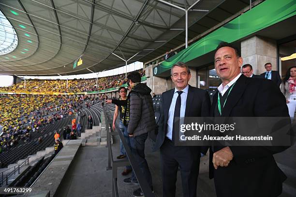 Wolfgang Niersbach, President of German Football Association talks to Tom Hanks prior to the DFB Cup Final match between Borussia Dortmund and FC...