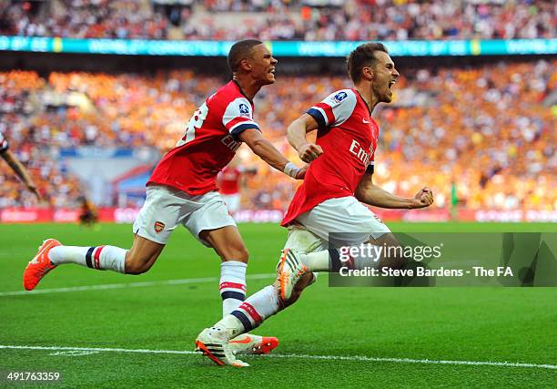 Aaron Ramsey of Arsenal celebrates with team-mate Kieran Gibbs after scoring their third goal during the FA Cup with Budweiser Final match between...