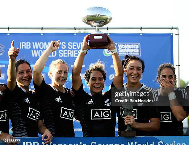 Huriana Manuel of New Zealand lifts the tourmant trophy during the IRB Women's Sevens World Series on May 17, 2014 in Amsterdam, Netherlands.