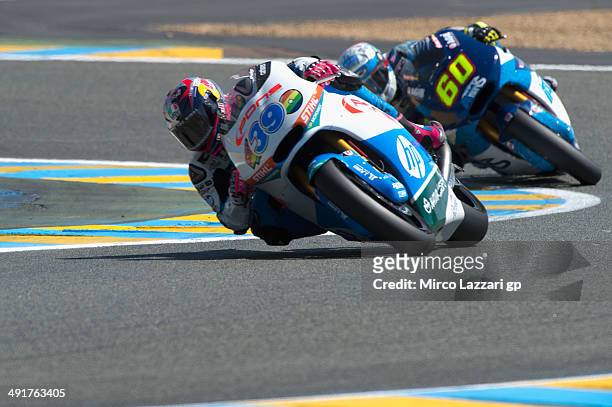 Luis Salom of Spain and Pons HP40 leads Julian Simon of Spain and Italtrans Racing Team during the MotoGp of France - Qualifying at on May 17, 2014...