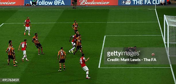 Aaron Ramsey of Arsenal looks on, as he scores his teams third goal during the FA Cup Final sponsored by Budweiser between Arsenal and Hull City at...