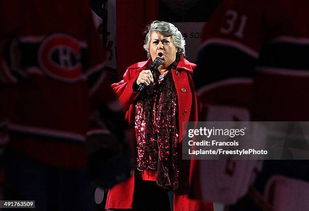 Author/composer/singer Ginette Reno performs the national anthem before Game One of the Eastern Conference Finals of the 2014 NHL Stanley Cup...