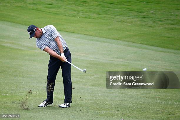 Gary Woodland plays a fairway shot on the sixth hole during the third round of the HP Byron Nelson Championship at the TPC Four Seasons on May 17,...