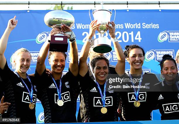 Huriana Manuel of New Zealand lifts the series trophy during the IRB Women's Sevens World Series on May 17, 2014 in Amsterdam, Netherlands.