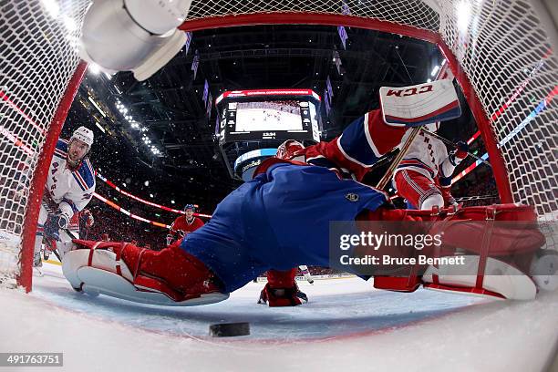 Mats Zuccarello of the New York Rangers scores a goal in the first period past goaltender Carey Price of the Montreal Canadiens in Game One of the...