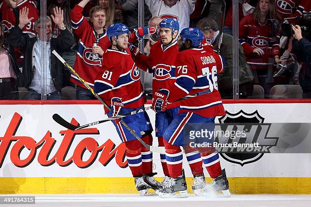 Rene Bourque of the Montreal Canadiens celebrates his second period goal with teammates Lars Eller and P.K. Subban of the Montreal Canadiens against...