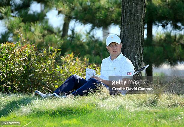 Jordan Spieth of the United States Team waits on the 11th tee during the Thursday foursomes matches at The Presidents Cup at Jack Nicklaus Golf Club...