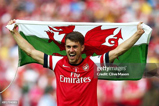 Aaron Ramsey of Arsenal celebrates victory after the FA Cup with Budweiser Final match between Arsenal and Hull City at Wembley Stadium on May 17,...