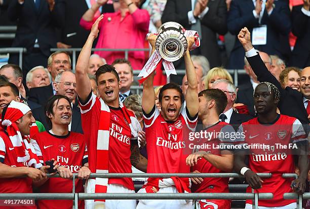 Mathieu Flamini of Arsenal celebrates with his team-mates as he lifts the FA Cup after the FA Cup with Budweiser Final match between Arsenal and Hull...