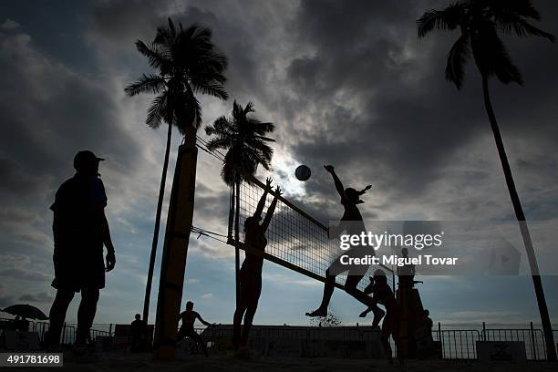 Amanda Dowdy United of States spikes the ball during the FIVB Puerto Vallarta Open at Camarones Beach on October 07, 2015 in Puerto Vallarta, Mexico.