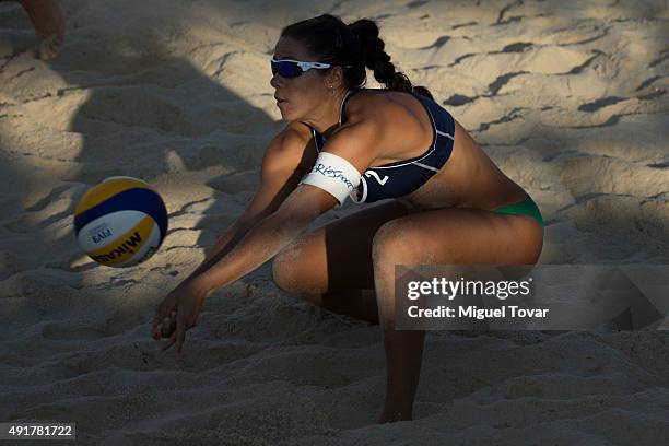 Barbara Alves of Brazil digs the ball during the FIVB Puerto Vallarta Open at Camarones Beach on October 07, 2015 in Puerto Vallarta, Mexico.