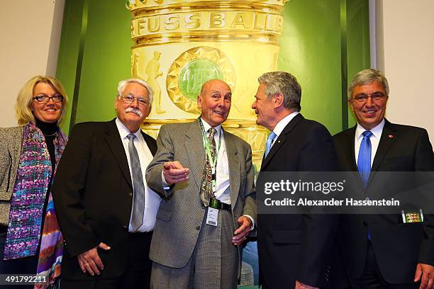 Horst Eckel talks to German President Joachim Gauck prior to the DFB Cup Final match between Borussia Dortmund and FC Bayern Muenchen at...