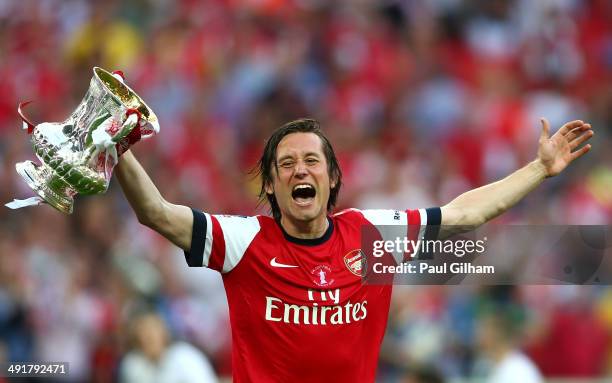 Tomas Rosicky of Arsenal celebrates victory with the trophy after the FA Cup with Budweiser Final match between Arsenal and Hull City at Wembley...