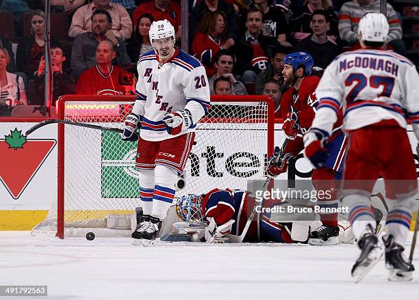 Chris Kreider of the New York Rangers celebrates the goal by teammate Derek Stepan in the third period against the Montreal Canadiens in Game One of...