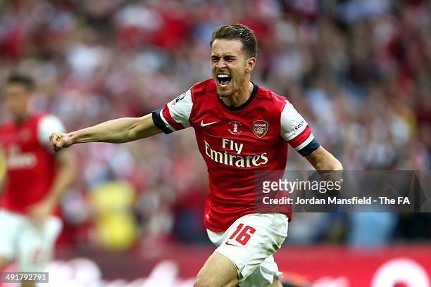 Aaron Ramsey of Arsenal celebrates after scoring to make it 3-2 during the FA Cup with Budweiser Final match between Arsenal and Hull City at Wembley...
