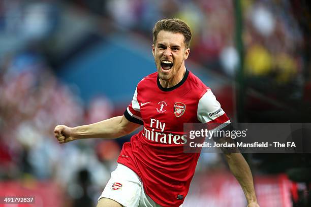 Aaron Ramsey of Arsenal celebrates after scoring to make it 3-2 during the FA Cup with Budweiser Final match between Arsenal and Hull City at Wembley...