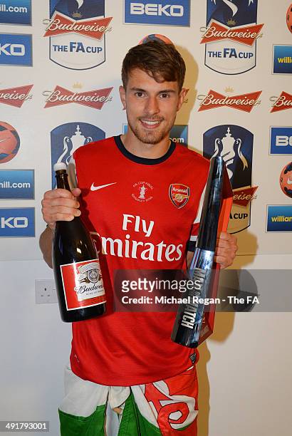 Aaron Ramsey of Arsenal poses with the man-of-the-match award after the FA Cup with Budweiser Final match between Arsenal and Hull City at Wembley...