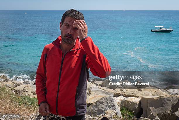 Former Societe General Bank trader Jerome Kerviel arrives near the French Border on May 17, 2014 in Ventimiglia, Italy. The former trader is facing...