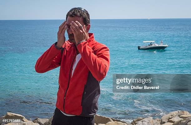 Former Societe General Bank trader Jerome Kerviel arrives near the French Border on May 17, 2014 in Ventimiglia, Italy. The former trader is facing...