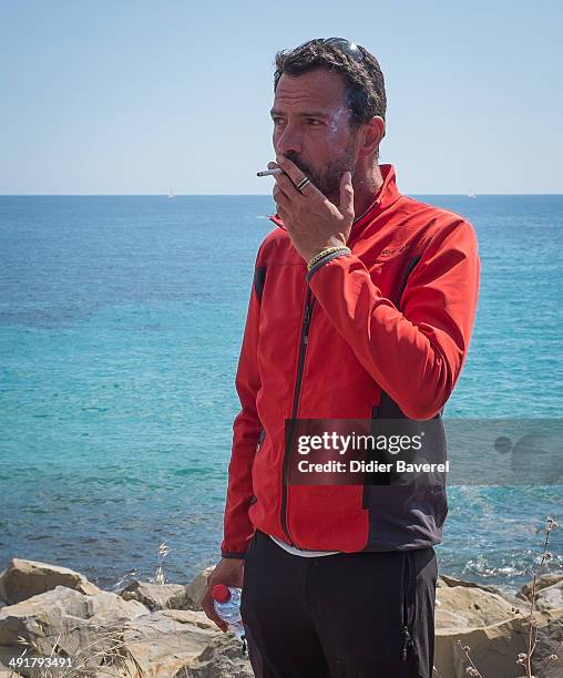 Former Societe General Bank trader Jerome Kerviel arrives near the French Border on May 17, 2014 in Ventimiglia, Italy. The former trader is facing...