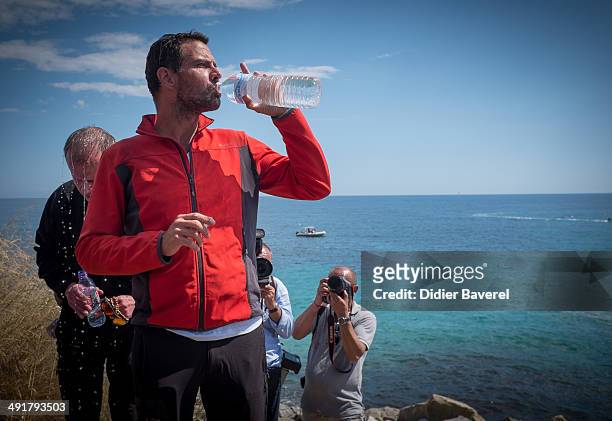 Former Societe General Bank trader Jerome Kerviel arrives near the French Border on May 17, 2014 in Ventimiglia, Italy. The former trader is facing...