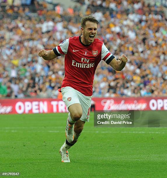Aaron Ramsey celebrates scoring Arsenal's 3rd goal during the match between Arsenal and Hull City in the FA Cup Final at Wembley Stadium on May 17,...