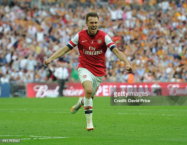 Aaron Ramsey celebrates scoring Arsenal's 3rd goal during the match between Arsenal and Hull City in the FA Cup Final at Wembley Stadium on May 17,...